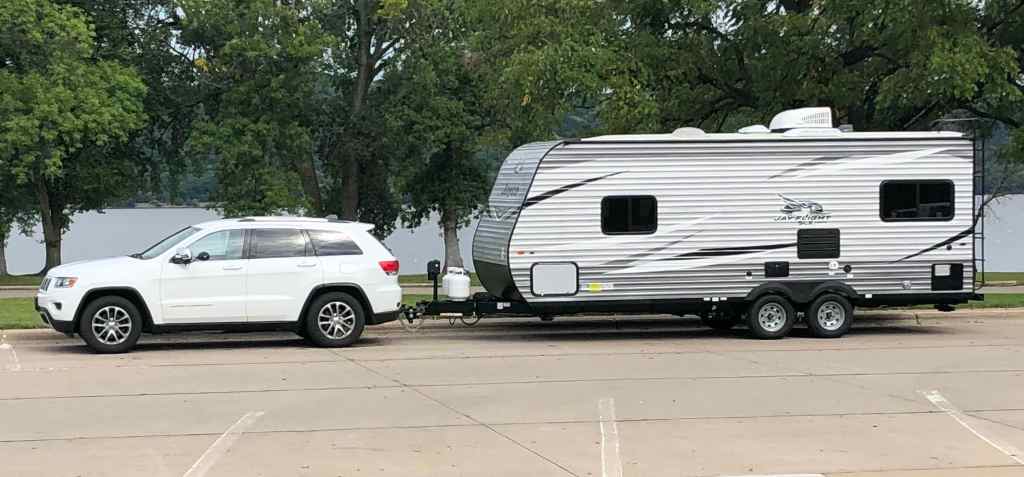 Jeep Grand Cherokee and Jayco Jay Flight 212QB at Lake City Minnesota rest area